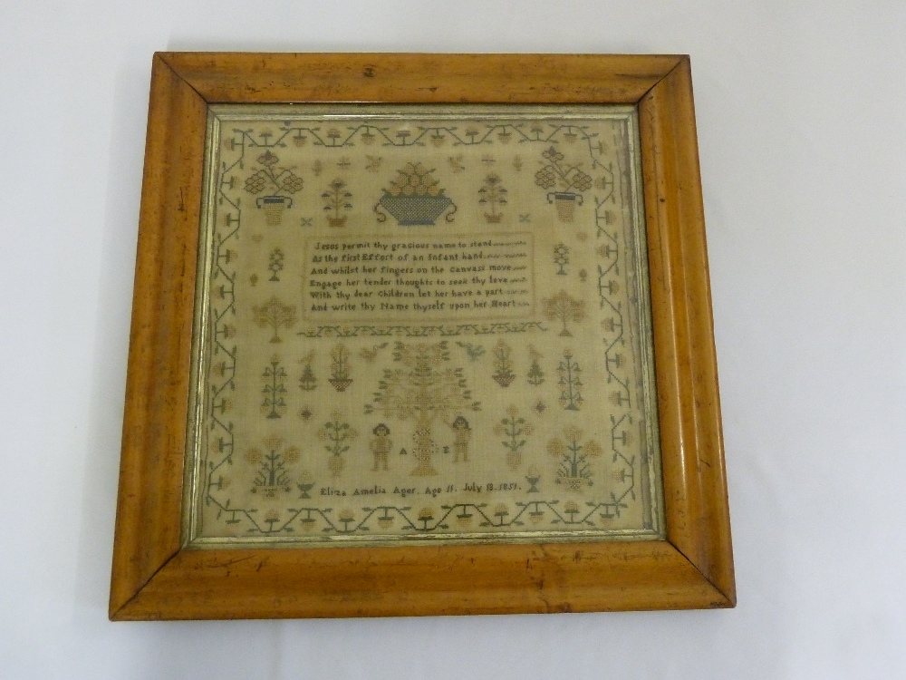 A mid Victorian sampler in maple wood frame