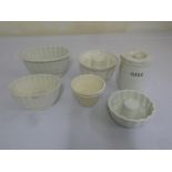 A quantity of Maling kitchenalia to include four jelly moulds, a rice container and a small bowl