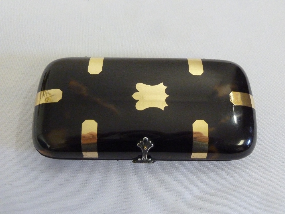 Tortoiseshell cigar case with gold strap work and silver clasp