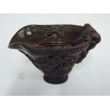 Chinese horn libation cup, carved with vegetation