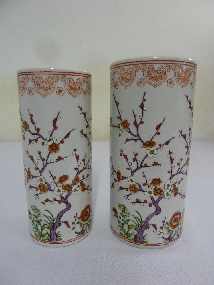 Two Chinese vases decorated with flowers, leaves and butterflies