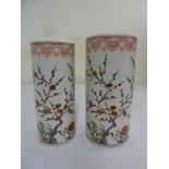 Two Chinese vases decorated with flowers, leaves and butterflies