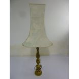 Gilded metal table lamp on raised circular base to include silk shade