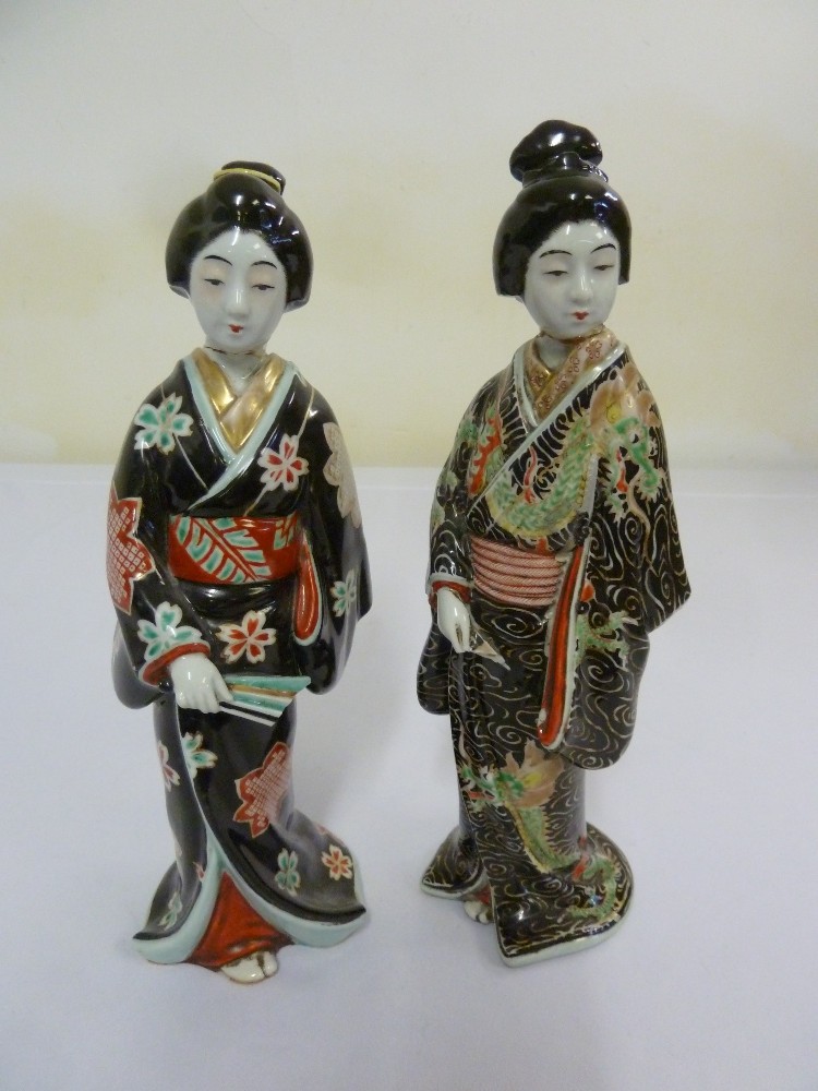 A pair of Oriental ceramic figurines of Geisha girls, A/F