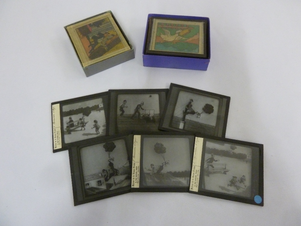 Three boxed sets of early 20th century coloured slides