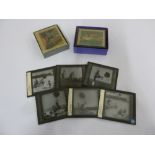 Three boxed sets of early 20th century coloured slides