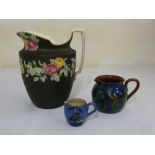 Three decorative ceramic jugs