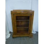 Edwardian mahogany rectangular bookcase with hinged glazed door on four bracket feet