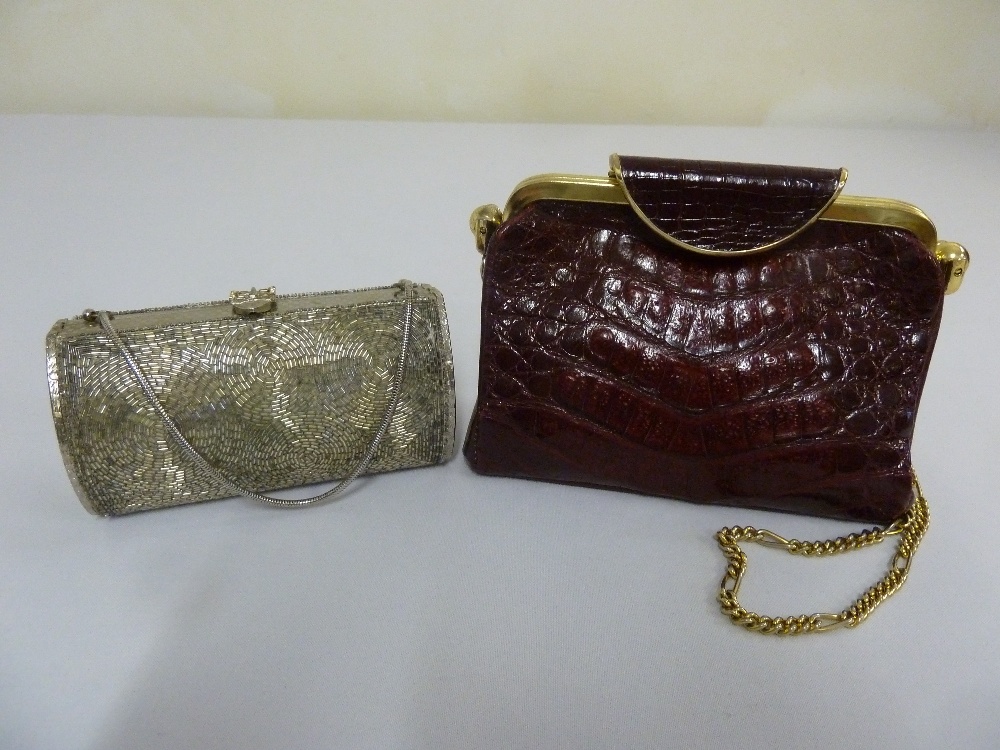 A faux crocodile ladies evening bag and another