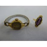 14ct gold ladies wristwatch on a gold plated expanding bracelet and 14ct yellow gold ring