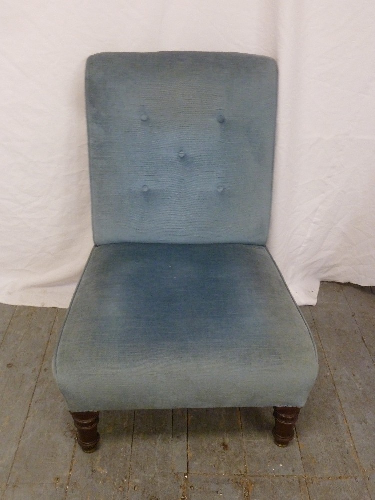 Edwardian upholstered nursing chair on four turned legs