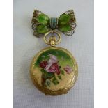 14ct gold ladies fob watch with polychromatic enamel decoration with bow brooch clip