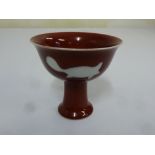 Chinese 20th century stem cup, red glazed, marks to the base