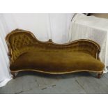Victorian upholstered chaise longue on four scroll legs