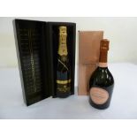 Moet and Chandon Grand Vintage champagne 2003 and Laurent-Perrier Cuvee rose champagne both in