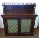 Georgian mahogany credenza with hinged double doors and gallery shelf