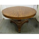 Victorian mahogany circular dining table on triform base with scroll feet, A/F