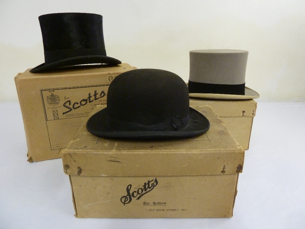 Scotts of London two top hats and a bowler hat, in original boxes