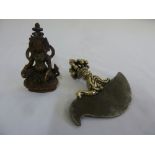A Tibetan bronze Buddha and Phurbar of customary form