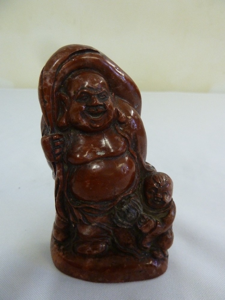 An early 20th century Chinese soapstone seal carved with Buddha and children