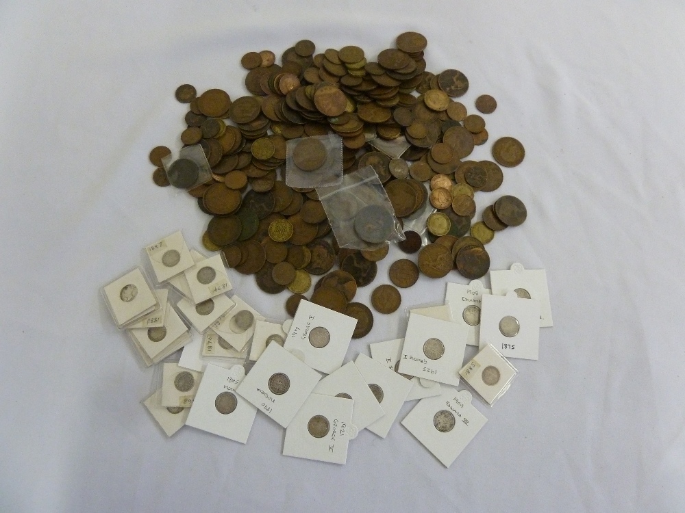 A quantity of English coins to include silver threepences and copper coins, George III to George VI