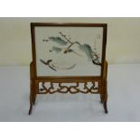 Chinese table screen with stylised bird and leaves in hardwood frame