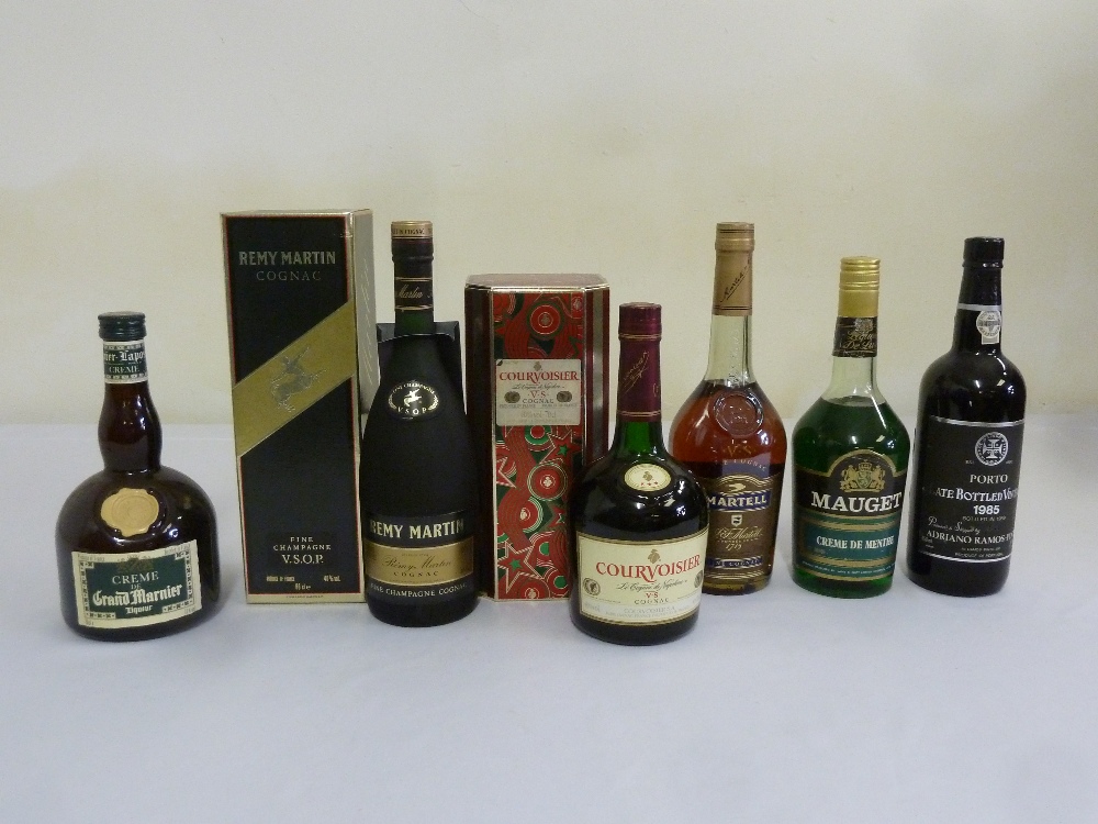 A quantity of Cognac and liqueurs to include Remy Martin, Courvoisier, Grand Marnier, Creme de