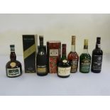 A quantity of Cognac and liqueurs to include Remy Martin, Courvoisier, Grand Marnier, Creme de
