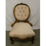 Victorian mahogany button back nursing chair on scroll legs