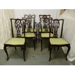 A set of six Chippendale style mahogany dining chairs to include two carvers