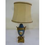 Sevres style table lamp on raised gilt metal base and silk shade