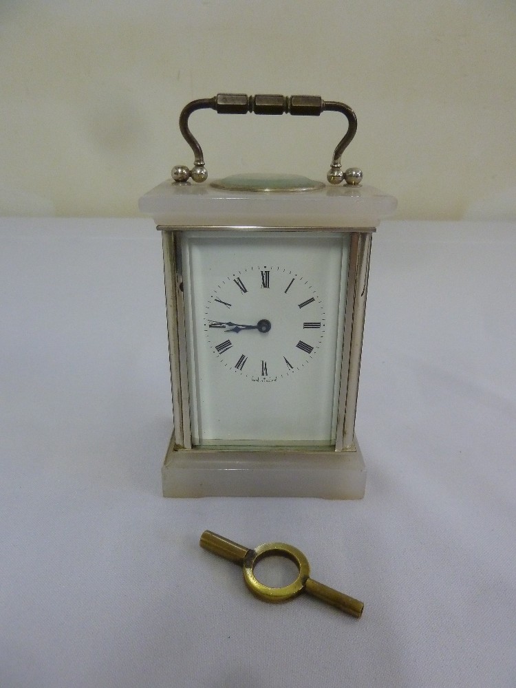 Marble and brass carriage clock of customary form to include key