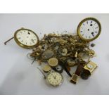 A quantity of clocks and watches and accessories