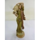 Royal Dux figurine of a lady carrying an urn, 43.5cm (h)