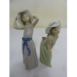 Two Lladro figurines of girls wearing hats, 27cm and 23cm (h)