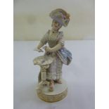 Meissen figurine of a lady in classical dress playing cards, marks to the base