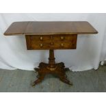 A Victorian mahogany side table with drop flap sides and two drawers on pedestal base