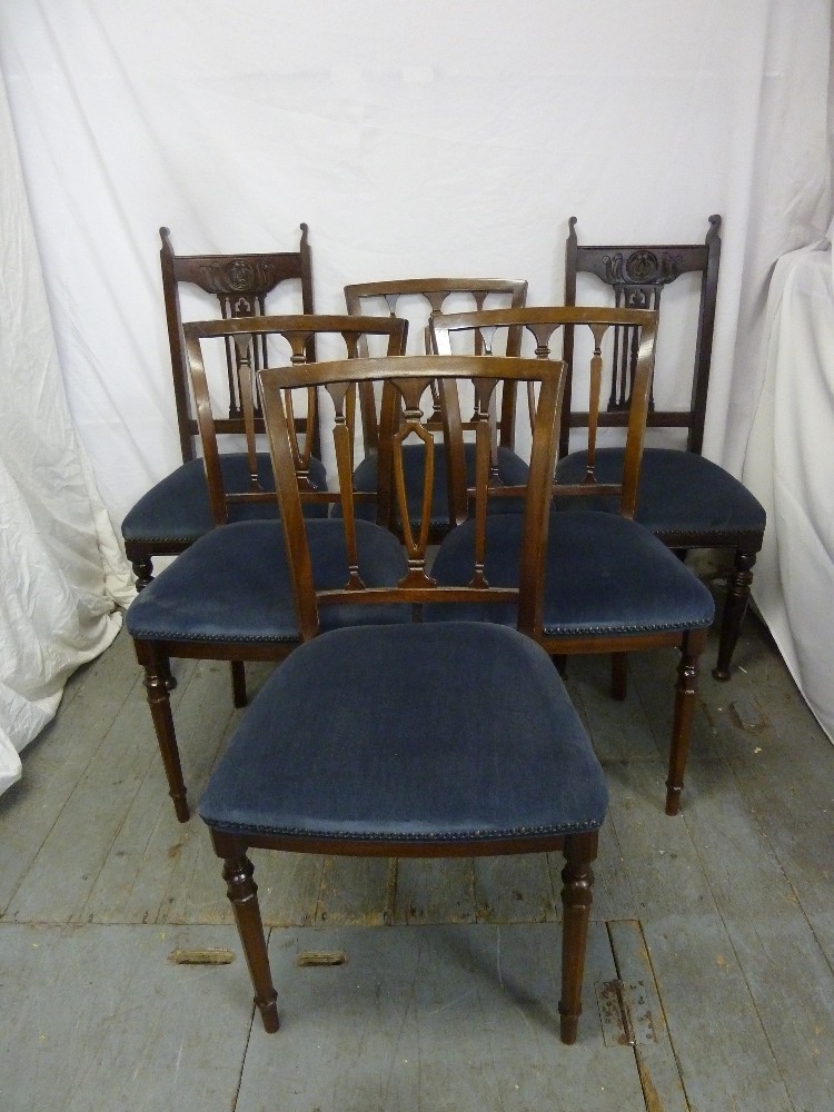 A harlequin set of six mahogany upholstered dining chairs