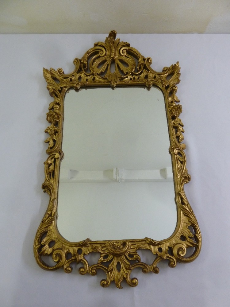 A French baroque style gilded wall mirror