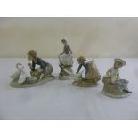 Four Lladro figurines to include model numbers 4849, 4826, 5553 and 6024