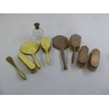 A quantity of silver to include a dressing table set, a scent bottle and clothes brushes, A/F, (9)