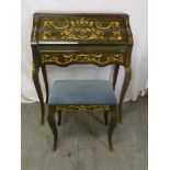 A Continental 20th century inlaid rectangular desk, decorated with flowers, leaves and scrolls on