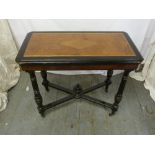A Victorian rectangular card table on four turned legs with burr walnut insert to the top