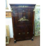 A French 19th century mahogany Empire period rectangular cabinet with cast brass classical figures