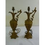 A pair of spelter urns in classical style converted to electric lamp bases