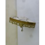 A brass and marble wall mounted corner table, marble A/F