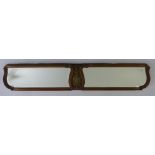 A French shaped rectangular wall mirror with brass mounts to the centre