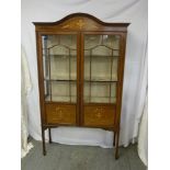 An Edwardian rectangular glazed display cabinet, inlaid decoration on four tapering legs, A/F