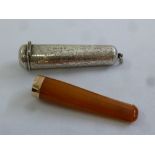 A Victorian amber and gold mounted cheroot holder in silver case with hinged cover, Chester 1898