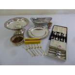 A quantity of silver plate to include fruit basket, a cake plate, a coaster and flatware
